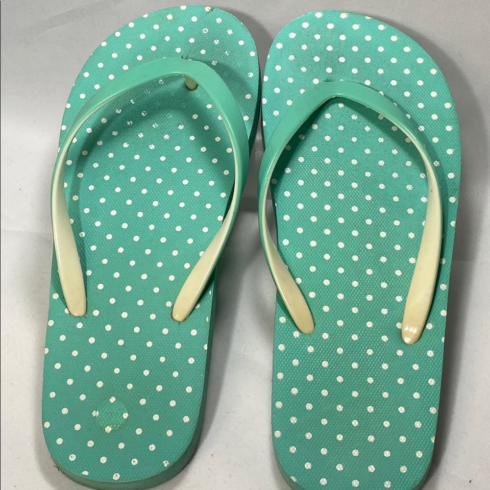 Good condition turquoise flip flops